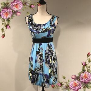 Candie’s floral sleeveless dress ties up in the back
